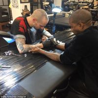 Tribute Tattoos For Mother and Daughter on the Wrists of Kanye West