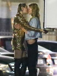 Miley Cyrus and Stella Maxwell kiss
