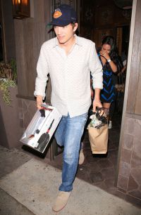 Mila Kunis receives presents from Ashton Kutcher at their Romantic Encounter