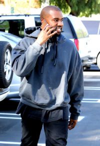 Kanye West Is a Happy Smiling Dad