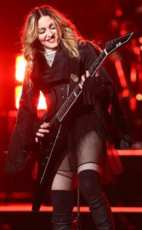Madonna Copes with an Awkward Wardrobe Malfunction on Stage
