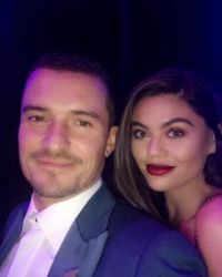 Orlando Bloom 'lit up' in the company of a young beauty