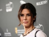 54-year-old Sandra Bullock still keeps the cheerleaders' form