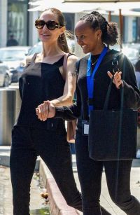Just like daddy: Angelina Jolie for a walk with her two daughters