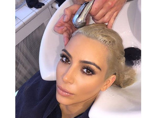 A ''Platinum Pimp'' Kim Kardashian Shows Her New Bright Blonde Hair Colour