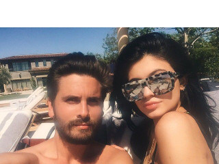 Kylie Jenner Idles in a Teenie Weenie Bikini Poolside with Scot Disick!