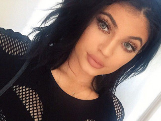 Kylie Jenner's Blue Lenses Can't Keep Up With Her Plump Lips