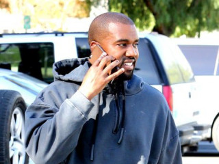 Kanye West Is a Happy Smiling Dad