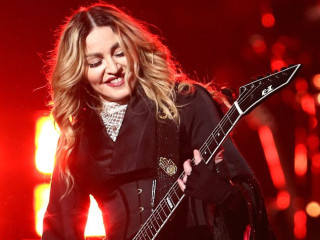 Madonna Copes with an Awkward Wardrobe Malfunction on Stage