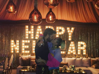 Liam Hemsworth And Miley Cyrus Enter the New Year With A Sweet Kiss
