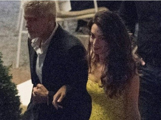 Amal Clooney emphasized the figure with a luxurious yellow sarafan
