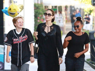 A father's copy: Angelina Jolie appeared in public with her grown-up daughter