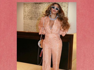 Thinned Beyonce poses in peach overalls
