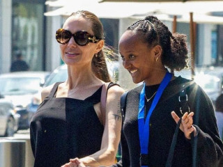 Just like daddy: Angelina Jolie for a walk with her two daughters