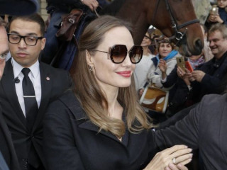 Angelina Jolie conquers Paris in a black dress