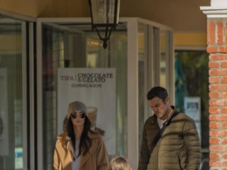 Megan Fox in a stylish gray hat walks in Hollywood