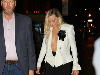 Outrageous Margot Robbie in a jacket without a bra
