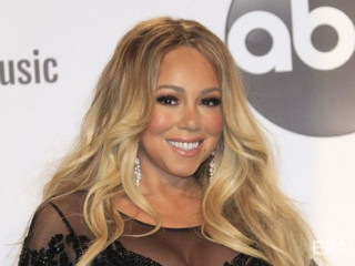 Mariah Carey celebrates 50 years at home in isolation