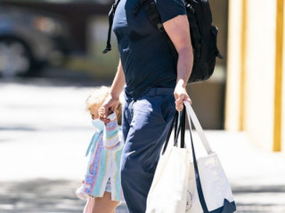 Bradley Cooper walks with his daughter Leah