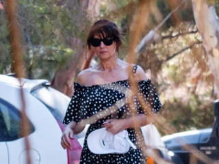 Monica Bellucci in a romantic dress is vacationing in Greece