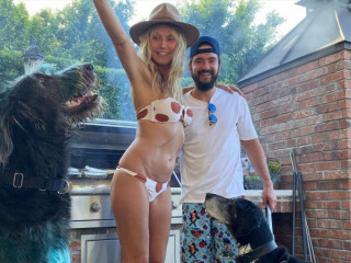 Heidi Klum, 47, flaunts her figure in a swimsuit