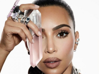 Kim Kardashian starred topless in advertising Crystal perfumes from KKW Beauty 