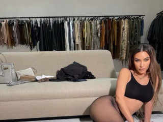 Kim Kardashian posed in tights