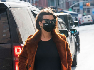 Emily Ratajkowski tried on a fluffy coat in New York City