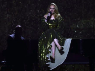 Adele sang on stage in a stunning Valentino outfit