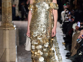 Gigi Hadid in a scalloped dress at Altuzarra, New York