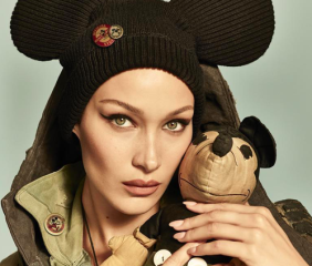 Bella Hadid shot with a 1932 Mickey Mouse doll