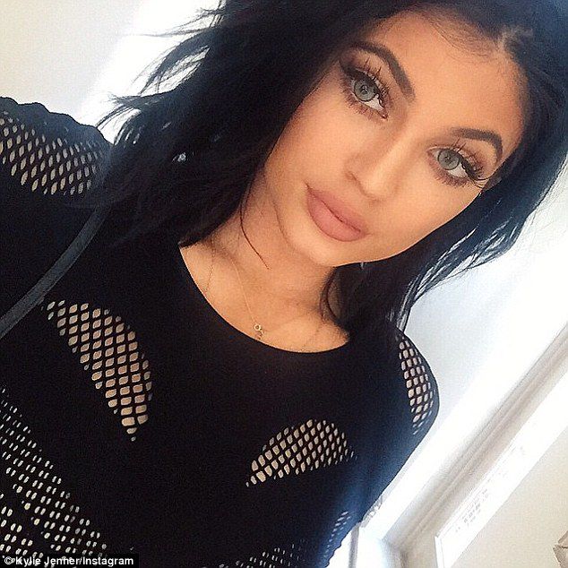 Kylie Jenner's Blue Lenses Can't Keep Up With Her Plump Lips