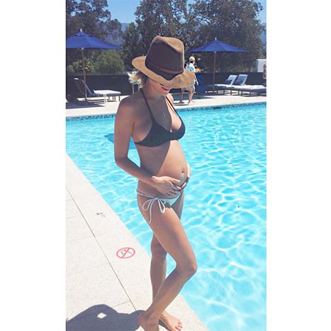 Pregnant Kristin Cavallari Cradles her Belly in Bikini near the Pool