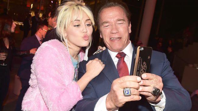 Arnold Schwarzenegger has Good Time with Miley Cyrus, the Ex of his Son