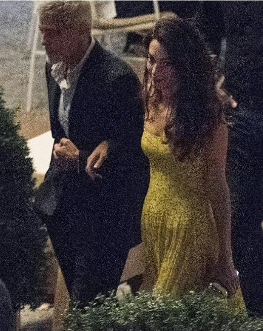 Amal Clooney emphasized the figure with a luxurious yellow sarafan