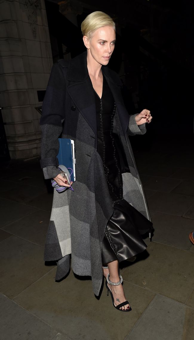 Charlize Theron has set the best example to combine dress and coat