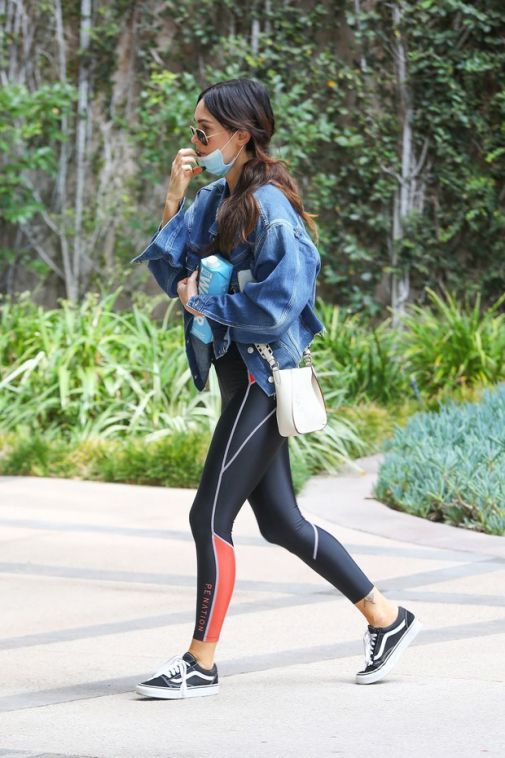 Megan Fox demonstrates perfect shapes in an oversize jacket and leggings